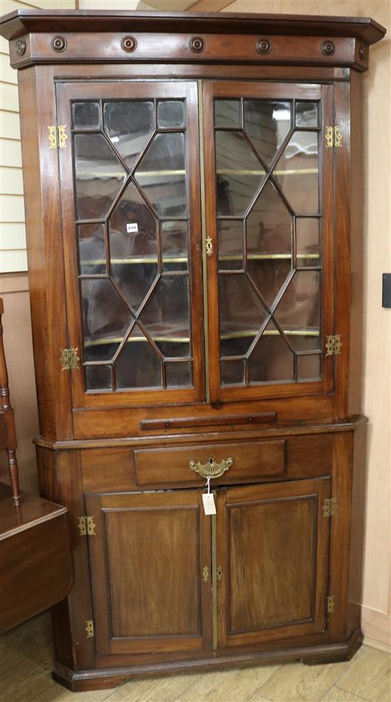 A George III mahogany standing corner cabinet H.213cm